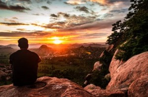 man-sitting-mountain-top-watching-260nw-1841201839.jpg copy